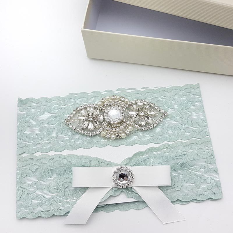 blue lace and crystal bridal garter set