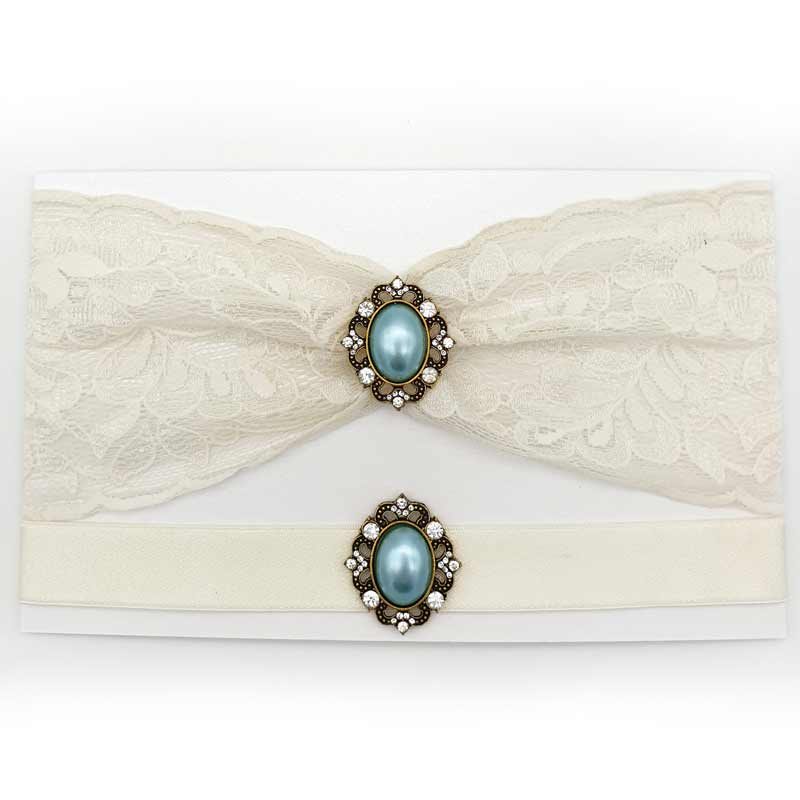 ivory lace garter set with blue buckles
