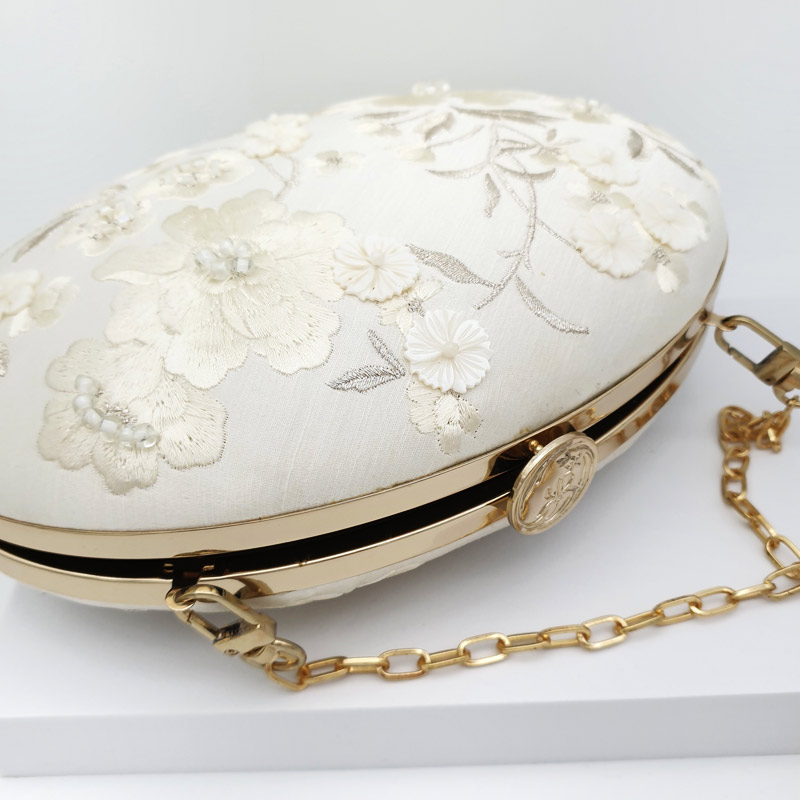 Ivory embroidered bridal clutch