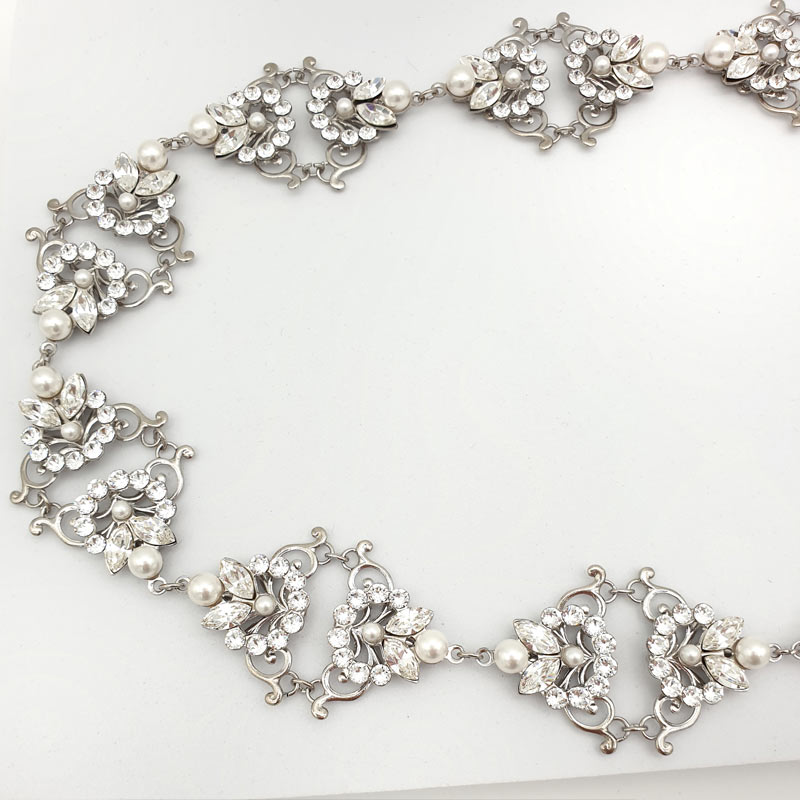 Silver bespoke crystal and pearl halo bridal hair piece